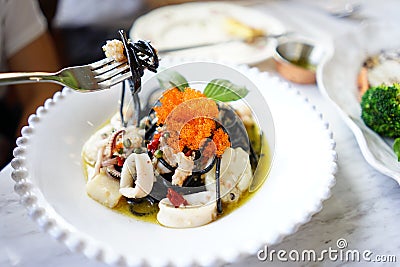 squid spaghetti black noodle with fish roe Stock Photo