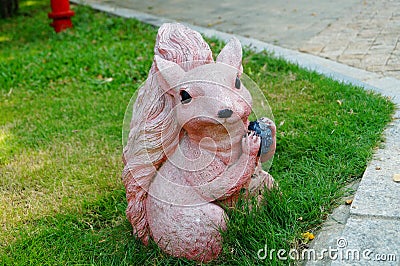 Squirrel statue Stock Photo