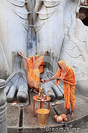 SRAVANABELGOLA, KARNATAKA, MAY 2016, Priests offer worship to gigantic statue of Bahubali, Chandragiri hill Editorial Stock Photo
