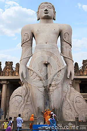 SRAVANABELGOLA, KARNATAKA, MAY 2016, Tourist and devotees at a gigiantic monolithic statue of Bahubali, also known as Gomateshwara Editorial Stock Photo