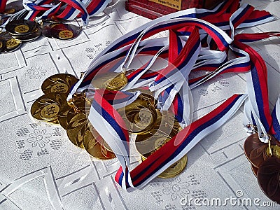 Sremska Mitrovica / Serbia - November 7, 2019: Medals for the Olympics or championship. The main sports award of the athlete. The Editorial Stock Photo