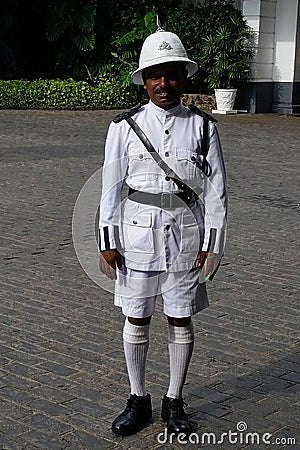 Man in colonial white guard uniform at Mount Lavinia Hotel Editorial Stock Photo