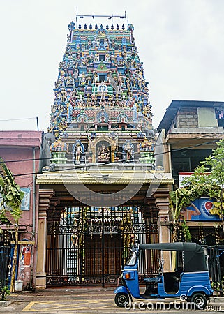 Tuk Tuk parked outside a Colorful Hindu temple Editorial Stock Photo