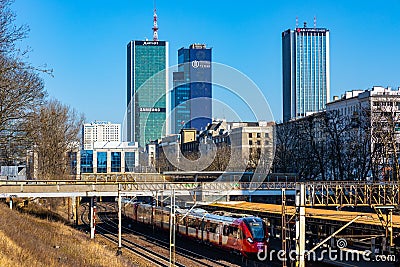 Srodmiescie district of Warsaw, Poland city center with Marriott hotel, Intraco and Orco Central Tower over metropolitan railway Editorial Stock Photo