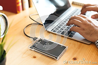 SSD and Laptop,solid state drive with sata 6 gb connection Stock Photo