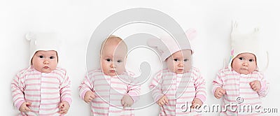 Cute adorable baby child with different warm white and pink hats. Happy baby girl on white background and looking at the Stock Photo