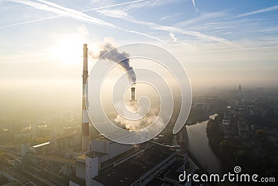 Aerial view of the smog over the city in the morning, smoking chimneys of the CHP plant and the city`s buildings - Wroclaw, Poland Stock Photo