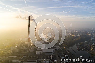 Aerial view of the smog over the city in the morning, smoking chimneys of the CHP plant and the city`s buildings - Wroclaw, Poland Stock Photo