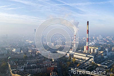 Aerial view of the smog over the city in the morning, smoking chimneys of the CHP plant and the city`s buildings - Wroclaw, Poland Stock Photo