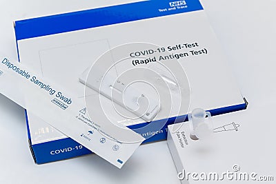 St Albans, Hertfordshire/England - 5 May 2021 - NHS provide coronavirus lateral flow or Rapid Antigen Test kits for people to self Editorial Stock Photo