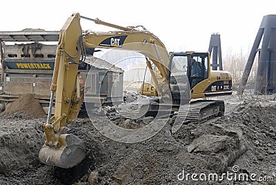 ST. CHARLES, UNITED STATES - Dec 23, 2008: Trackhoe digging on a construction site Stock Photo