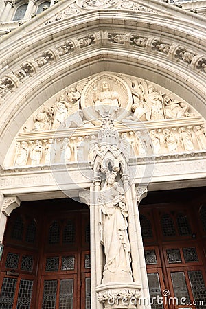 St. Finbarr`s Cathedral - carvings of biblical characters at entrance door - Irish religious tour - Ireland travel Stock Photo