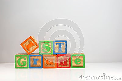 1st Grade spelled out with ABC blocks Stock Photo