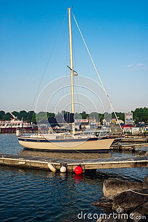 St Ignace, MI - July 14, 2021: Small sail boat moored at St Ignace on MI on July 14, 2021. Editorial Stock Photo