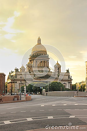 St. Isaacs Cathedral at sunset in St. Petersburg, Russia. Yellow and golden colours. Stock Photo