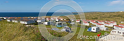 St Ives Bay Cornwall with static caravans and camping in summer panoramic view Stock Photo