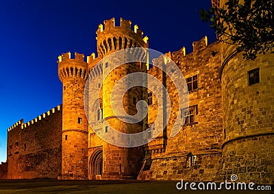 St John knights castle in night at Rhodes island, Greece Stock Photo