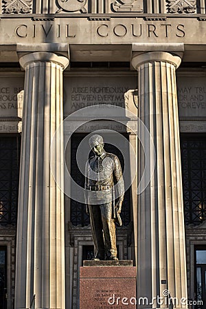 St Louis, Missouri, USA, January 2020 - Fallen police officer statue in front of Civil Courts building downtown St Louis Editorial Stock Photo