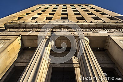 St Louis, Missouri, USA, January 2019 - Looking up at Civil Courts building with stone Greek flutted columns and ornate design Editorial Stock Photo