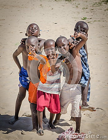 St Louis, Senegal - October 20, 2013: Portrait of friend group of unidentified African boys posing and having fun Editorial Stock Photo