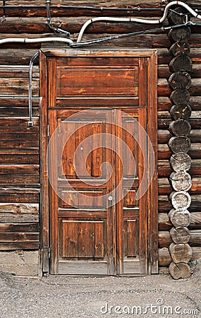 1st of May 2016, Russia, Tomsk, old fashioned door of wooden house Editorial Stock Photo