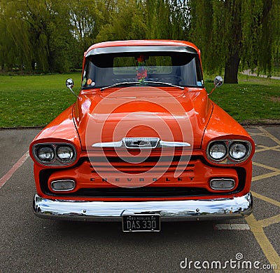 Vintage 1958 Chevrolet Apache pick-up - DAS 330 in Orange view from front. Editorial Stock Photo