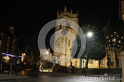 St Nicholas Church Alcester Warwickshire UK at Night With Christmas Lights. Stock Photo