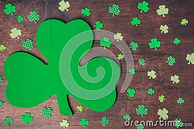 St Patrick`s Day background of a large wooden shamrock painted green Stock Photo