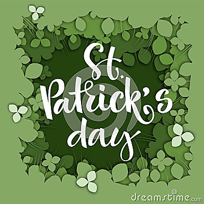 St. Patrick`s day calligraphy logo on green paper cut clover background Stock Photo