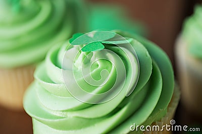 Close up of green cupcake with shamrock decoration Stock Photo