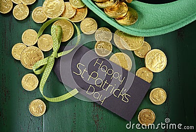 St Patricks Day leprechaun hat with gold chocolate coins Stock Photo