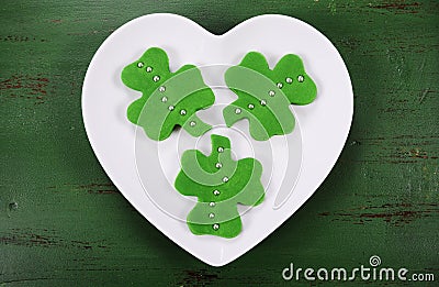 St Patricks Day shamrock shape green fondant cookies Stock Photo