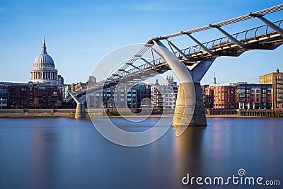 St Paul's Cathedral and Millennium Bridge in sunset, London, UK Editorial Stock Photo