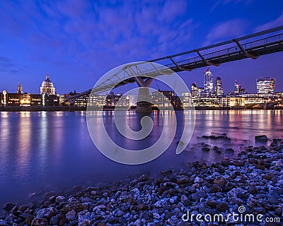 St. Pauls and the Millennium Bridge in London Editorial Stock Photo