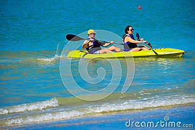 Couple practice kayaking around the St. Pete Beach 5 Editorial Stock Photo