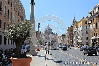St. Peter`s Basilica in the Vatican seen from Via della Conciliazione.Rome Editorial Stock Photo