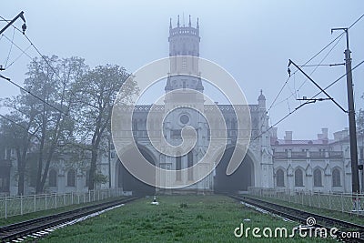 St. Petersburg, Peterhof at dawn in the summer in the fog. Thick white fog. The railway is in a fog. A thoughtful, heartfelt, extr Stock Photo