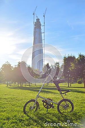 Bicycle Strida in park. Editorial Stock Photo