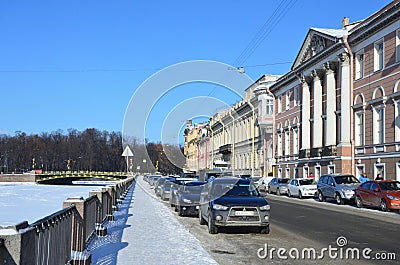 St. Petersburg, Russia, February, 27, 2018. Cars near the house of Pashkov, mansion of Levashov, 1836 year of construction. Embank Editorial Stock Photo