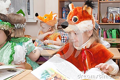 ST. PETERSBURG, RUSSIA - DECEMBER 28: Festively dressed children are engaged in kindergarten,RUSSIA - DECEMBER 28 2016. Editorial Stock Photo