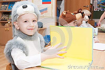 ST. PETERSBURG, RUSSIA - DECEMBER 28: Festively dressed children are engaged in kindergarten,RUSSIA - DECEMBER 28 2016. Editorial Stock Photo