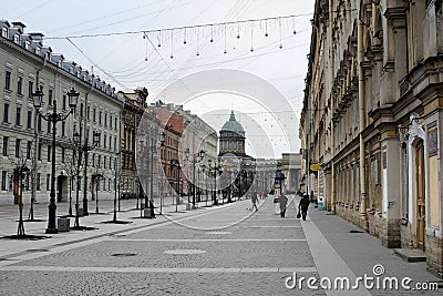St. Petersburg, Russia, December 2019. Perspective of a pedestrian street in the city center overlooking St. Isaac`s Cathedral. Editorial Stock Photo