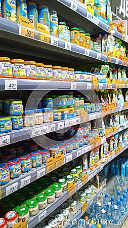 Top Russian Supermarket is one of largest players of retail industry in Russia. Shelves with children food. Fresh products for Editorial Stock Photo