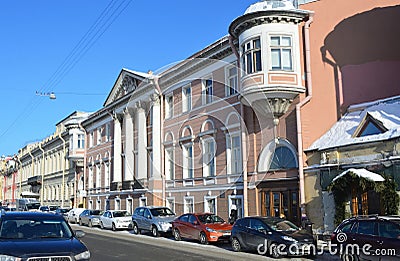 St. Petersburg, Russia, February, 27, 2018. Cars near the house of Pashkov, mansion of Levashov, 1836 year of construction. Embank Editorial Stock Photo