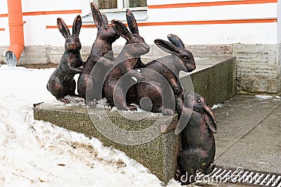 St. Petersburg, Russia, January 2, 2019. Sculptural group of bronze hares in the courtyard of the Peter and Paul Fortress. Editorial Stock Photo