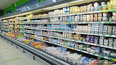 Top Russian Supermarket is one of largest players of retail industry in Russia. Shelves with dairy products, healthy yogurt. Rack Editorial Stock Photo