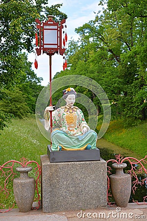 Chinese figure in traditional dress in Tsarskoe Selo. Editorial Stock Photo