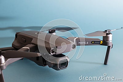 ST. PETERSBURG, RUSSIA - MARCH, 2019: DJI Mavic 2 pro with Hasselblad camera against blue background - an andvanced prosumer drone Editorial Stock Photo