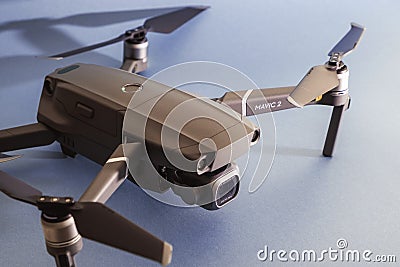 ST. PETERSBURG, RUSSIA - MARCH, 2019: DJI Mavic 2 pro with Hasselblad camera against blue background - an andvanced prosumer drone Editorial Stock Photo