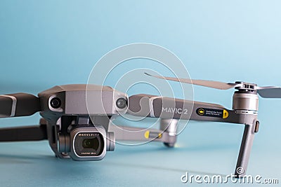 ST. PETERSBURG, RUSSIA - MARCH, 2019: DJI Mavic 2 pro with Hasselblad camera against blue background - an andvanced prosumer drone Editorial Stock Photo